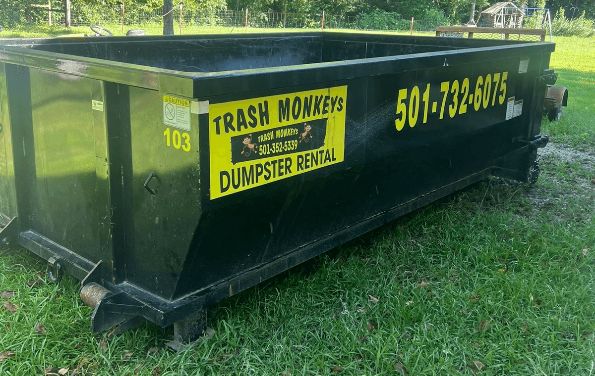 TrashMonkeys Dumpster Rental truck on a route